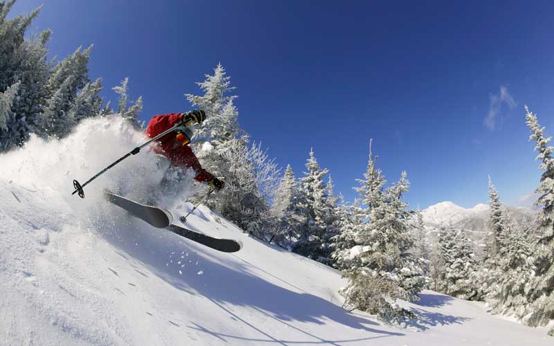 A man is skiing through the mountains of Beaver Creek