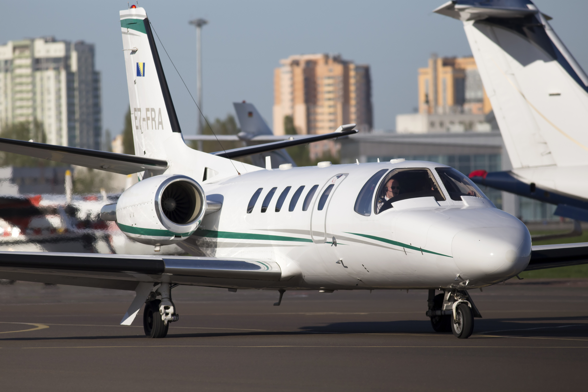 A Cessna Citation Bravo private jet riding on the runway