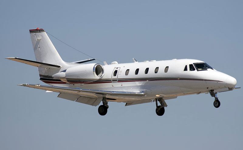  a Citation Excel private jet preparing for landing