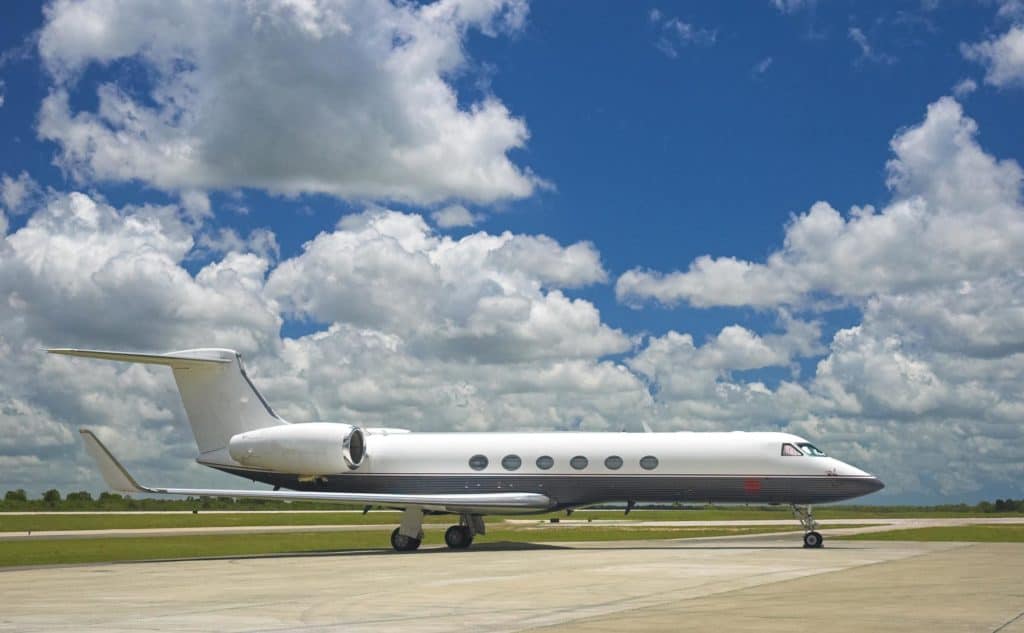 A gulfstream standing on tarmac