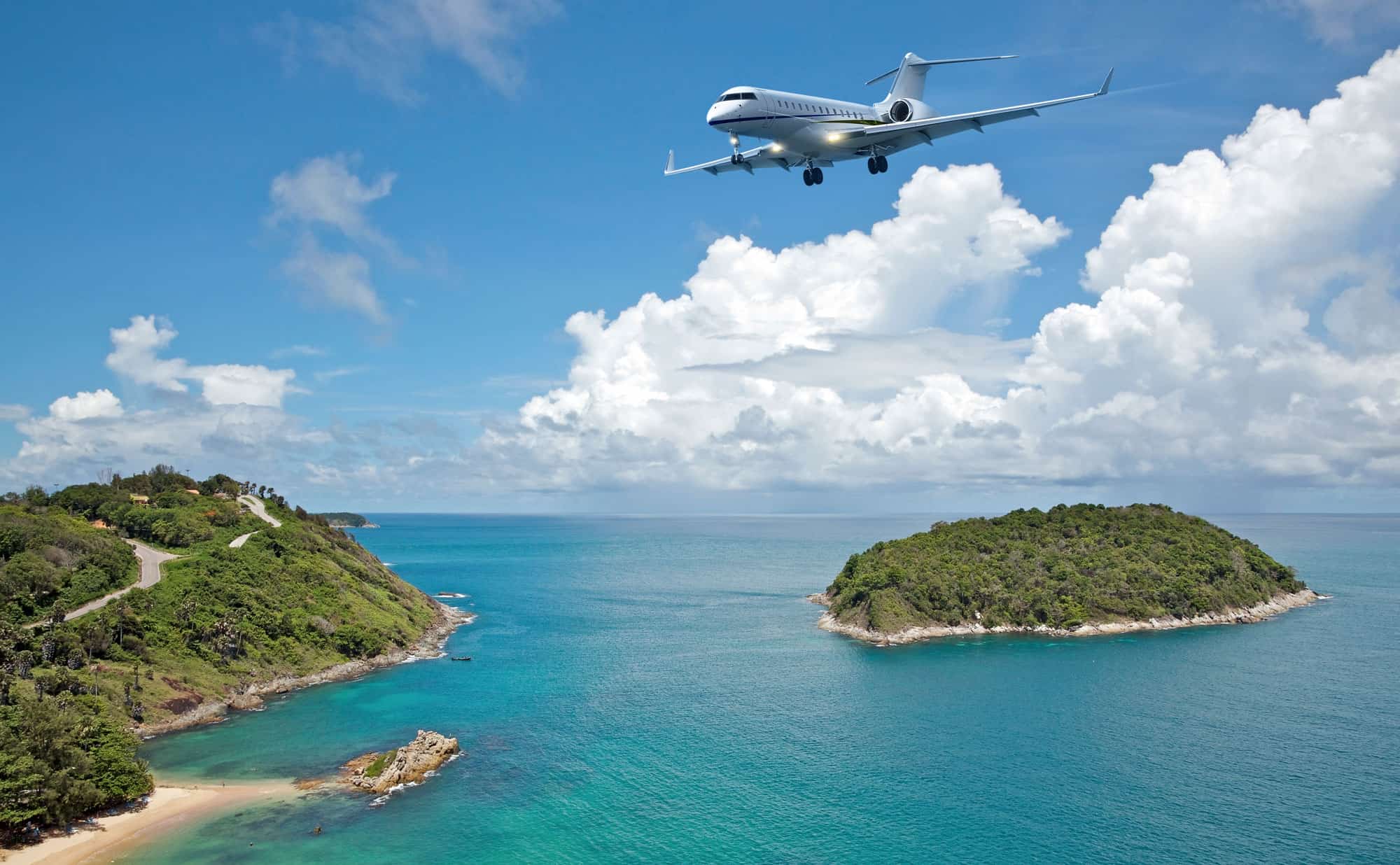 a private jet about to land on an island